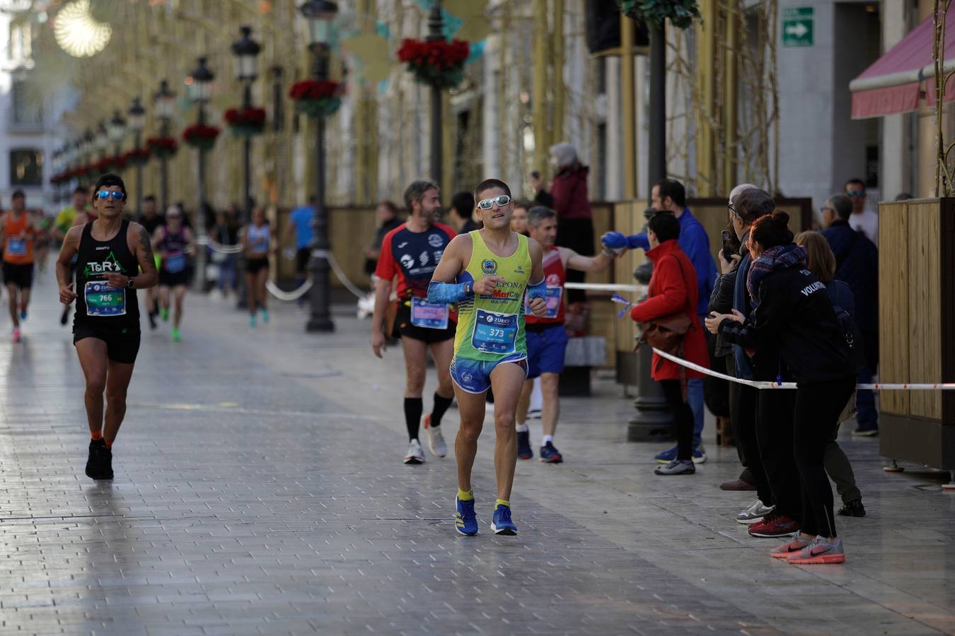 Los corredores, en calle Larios