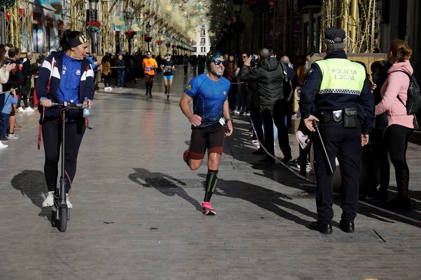 Los corredores, en calle Larios