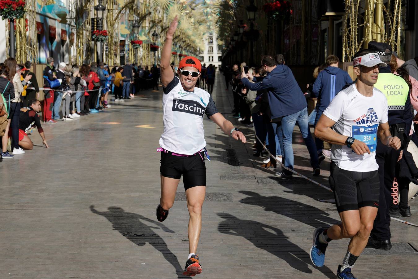 Los corredores, en calle Larios