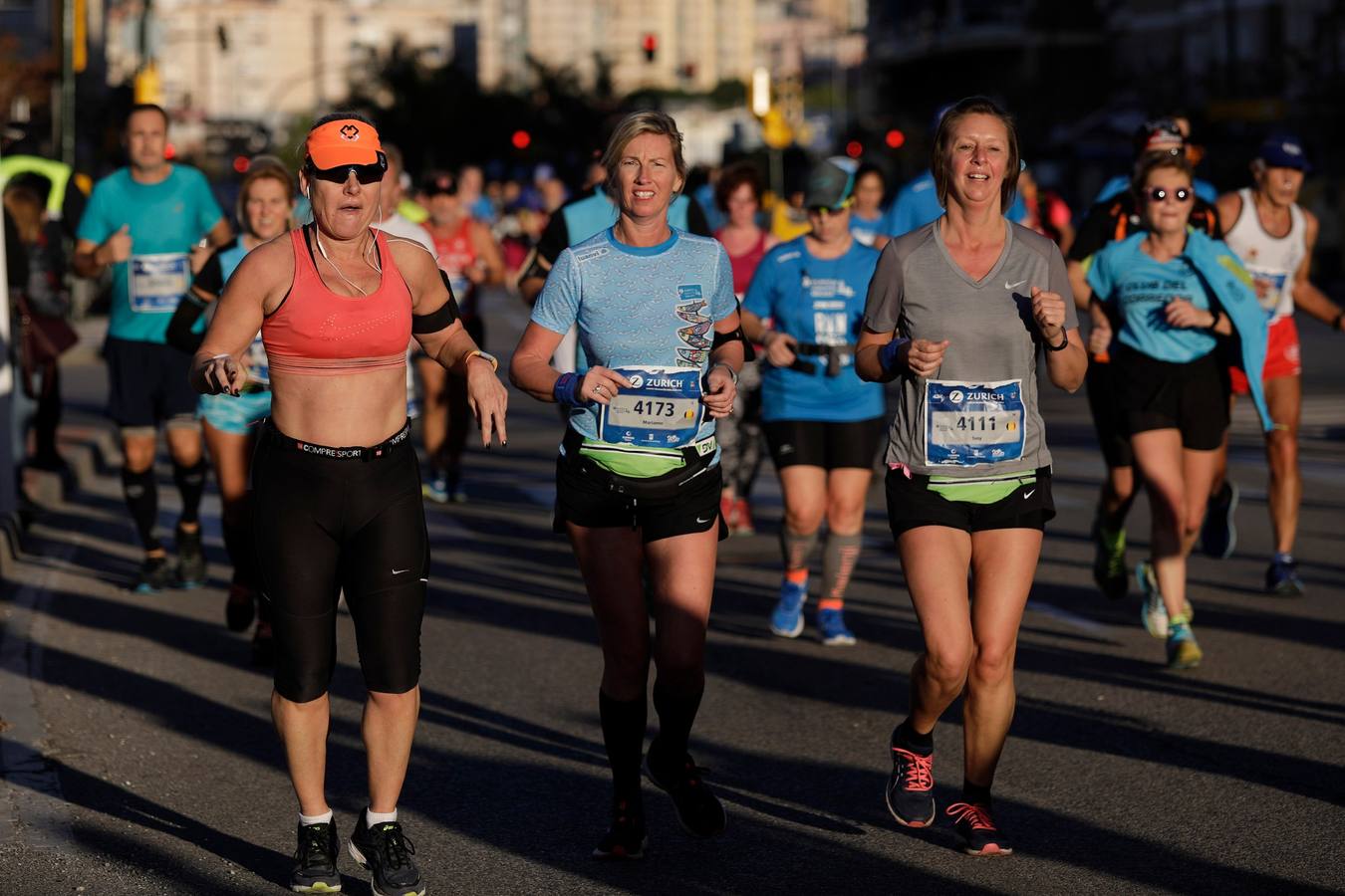 En la imagen, los corredores, en calle Princesa