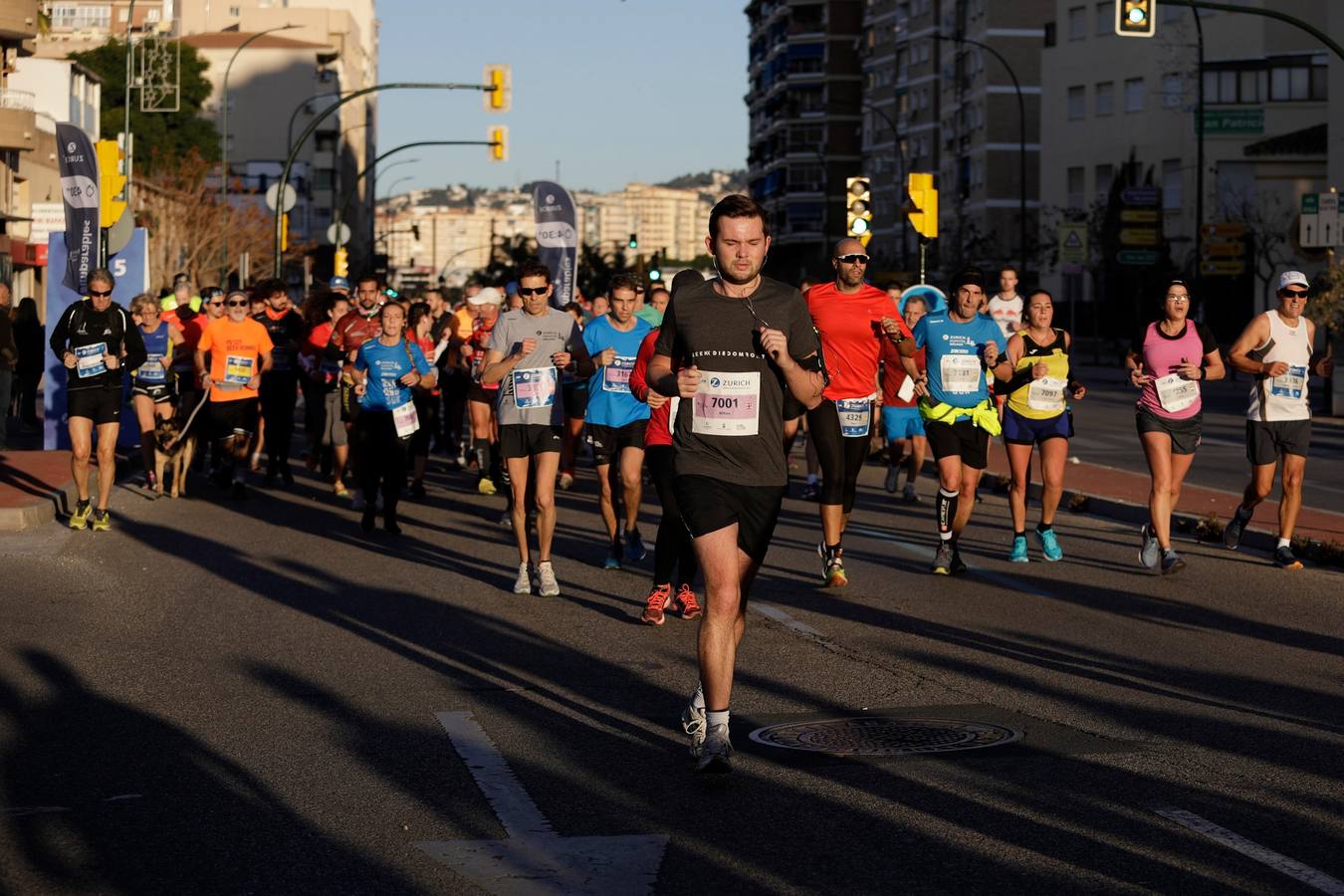 En la imagen, los corredores, en calle Princesa