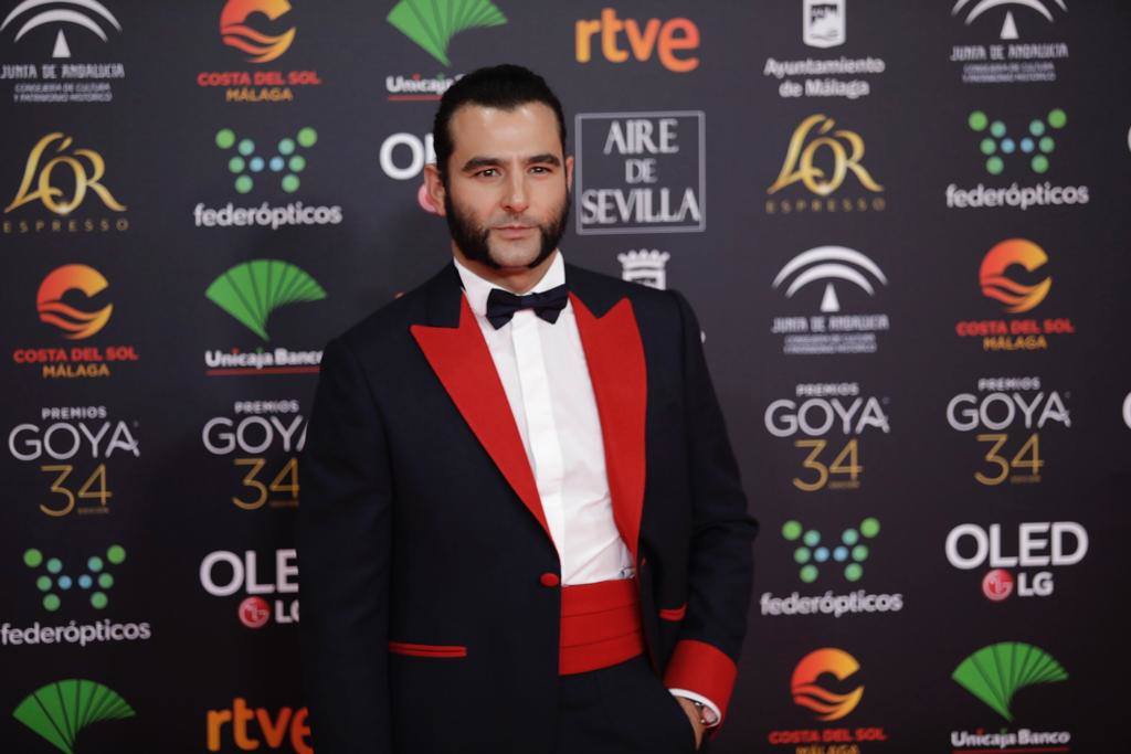 Desfile de los famosos asistentes a la gala en el Palacio de Deportes. 