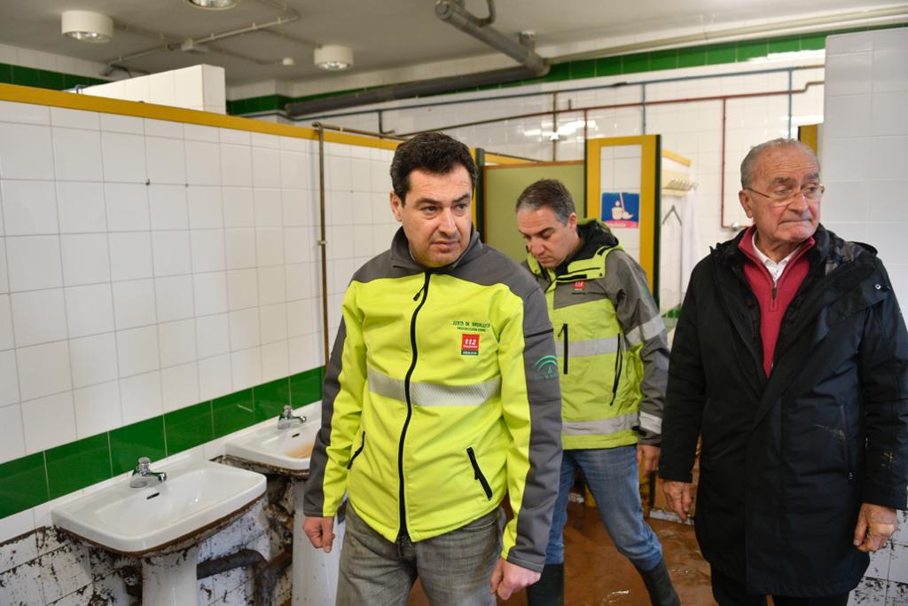 Efectos de las últimas lluvias en Campanillas. Juanma Moreno junto a Elías Bendodo y Francisco de la Torre.