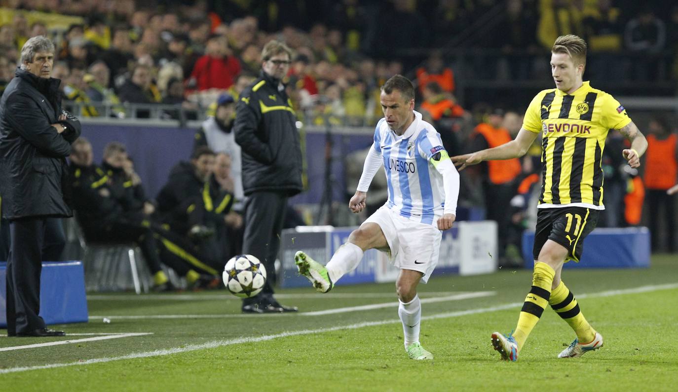 La injusta eliminación del Málaga en la Champions en el campo del Dortmund cumple hoy siete años con las mismas dudas que el primer día. Revive aquel momento foto a foto.