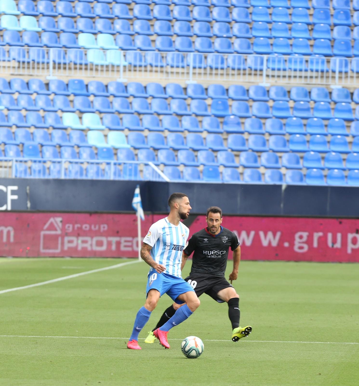 La vuelta del fútbol a La Rosaleda tras el parón de LaLiga por la pandemia