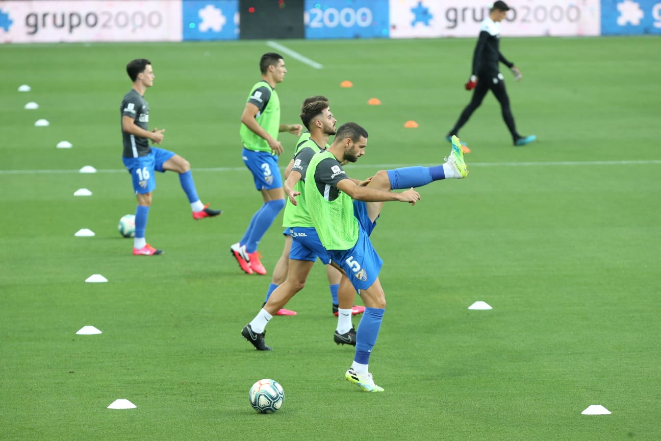 Todos los momentos del partido en imágenes desde La Rosaleda, que por segunda vez abre sus puertas para el fútbol pero sin aficionados en las gradas. 
