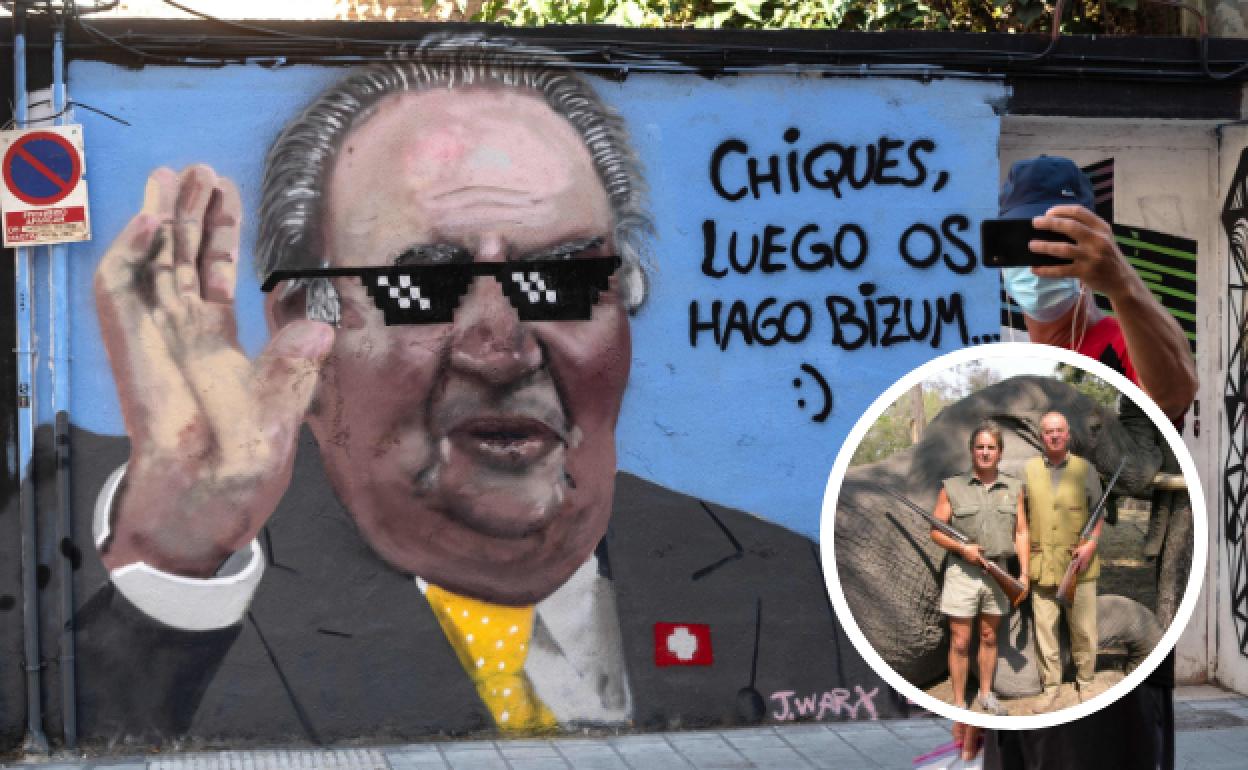 En grande. Un hombre se fotografía en Valencia junto a un grafiti del rey emérito. Debajo. Don Juan Carlos en una jornada de caza en Botsuana en 2006.