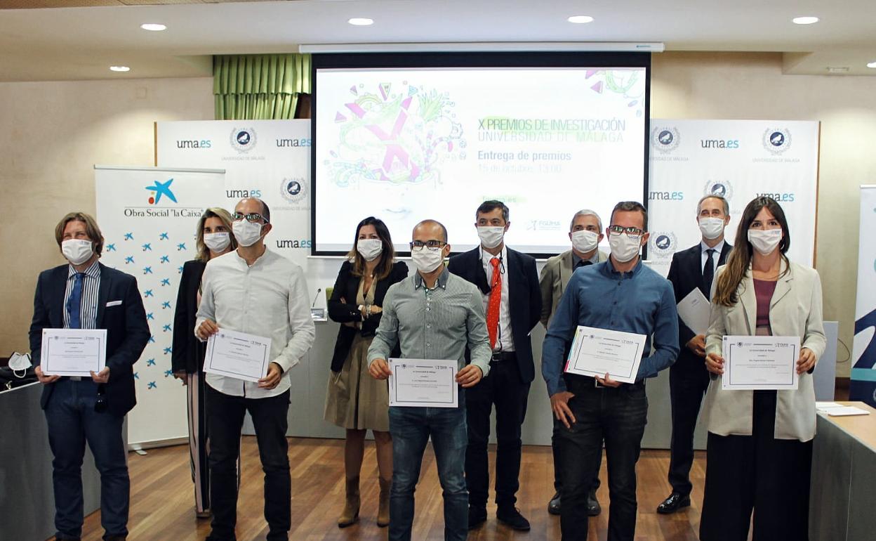 Los premiados, en primer término, en el acto celebrado en el Rectorado de la UMA. 