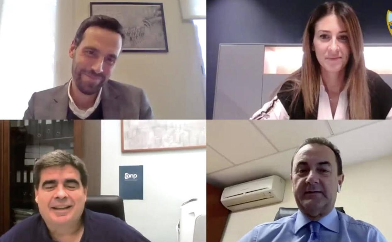 Responsables de empresas junto a José María Muñoz, abaja a la derecha, durante la reunión telemática. 