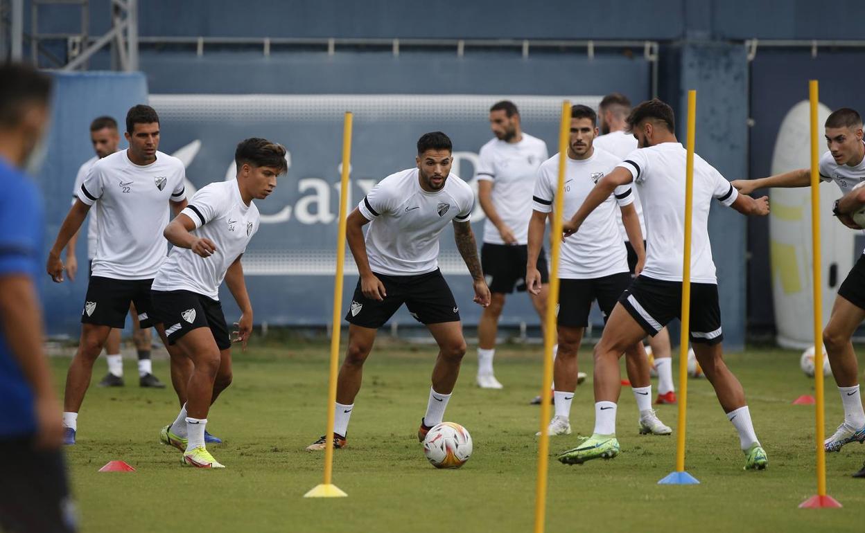 Kevin y Antoñín, en el entrenamiento de ayer poco antes de viajar a Baleares. 