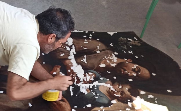 Proceso de estucado del lienzo de San José. 