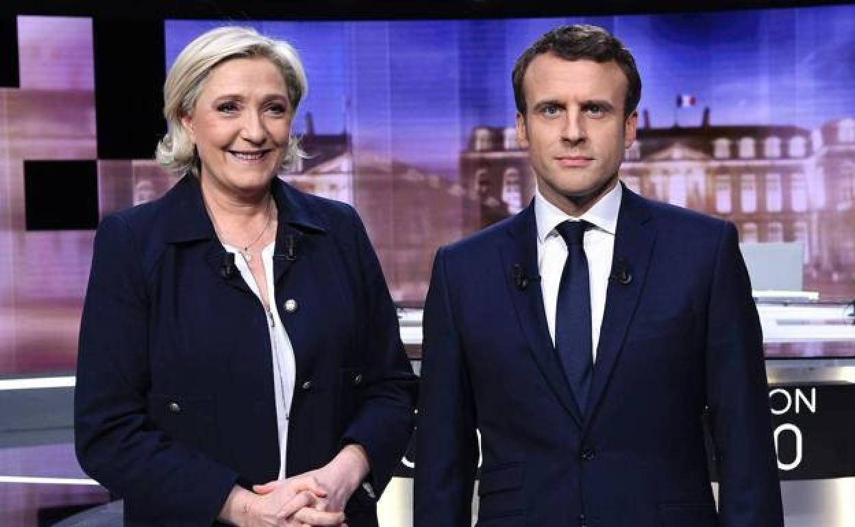 El presidente Emmanuel Macron y la candidata ultranacionalista Marine Le Pen