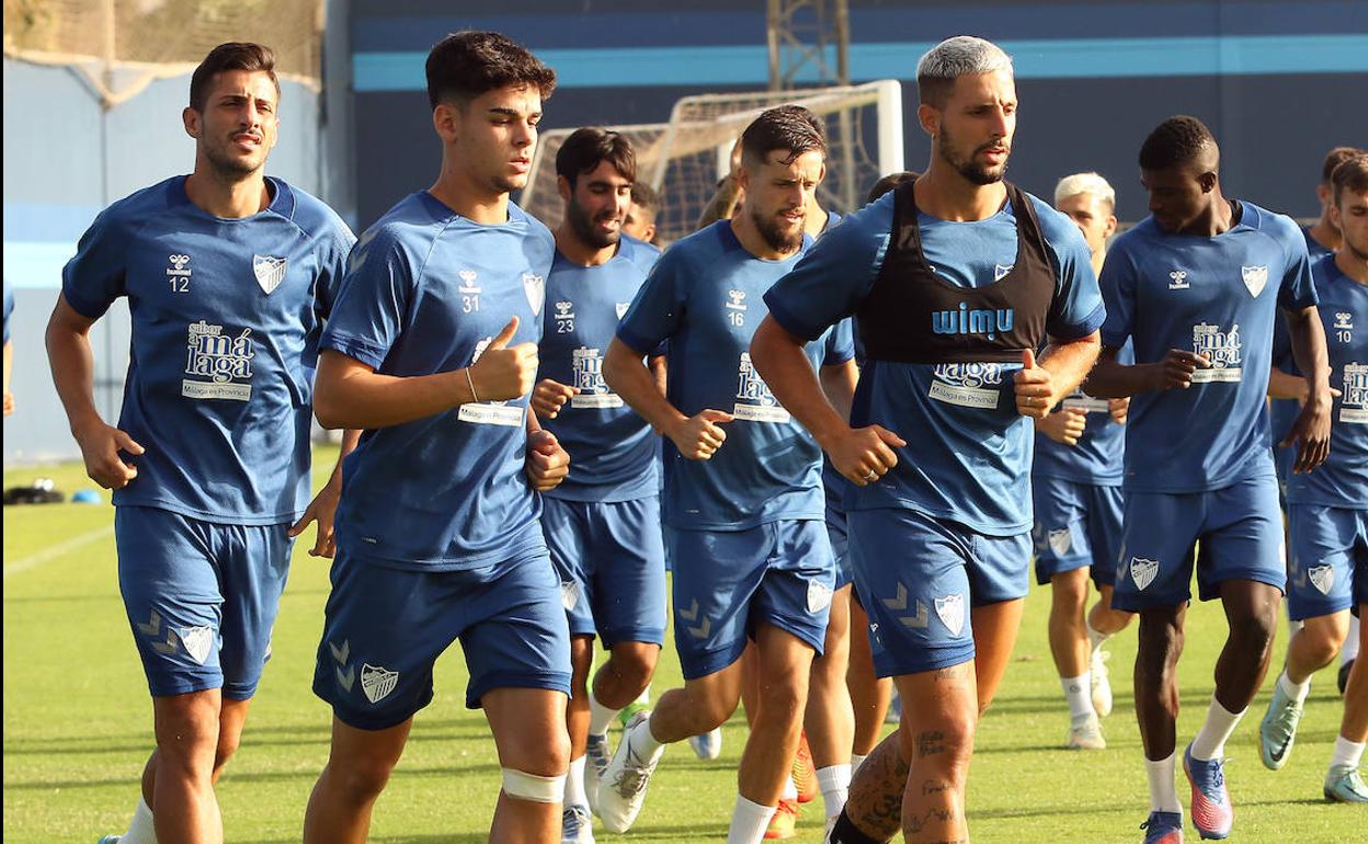 Andrés Caro hace carrera continua junto a Fran Sol en el entrenamiento de este miércoles. 