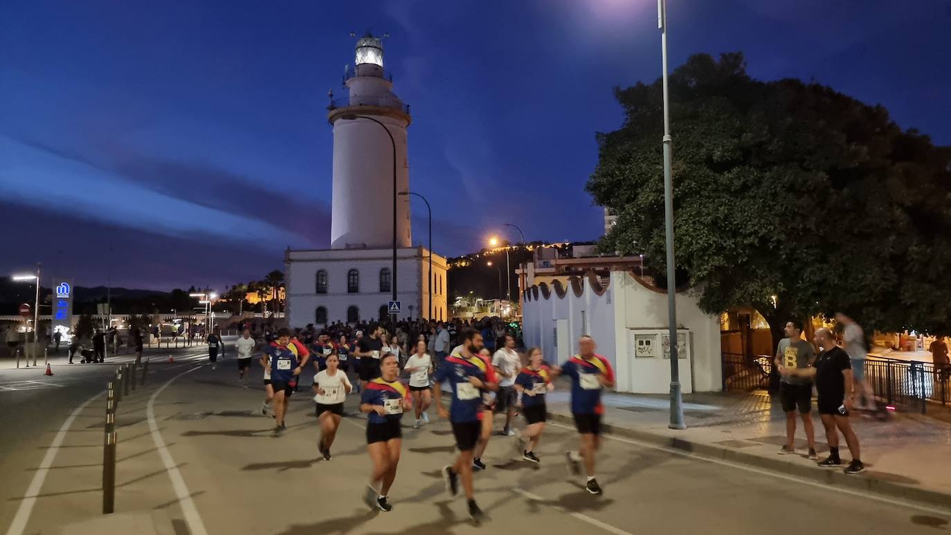 Fotos: Cuarta edición de la carrera solidaria &#039;Ruta 091&#039; impulsada por la Policía Nacional en Málaga