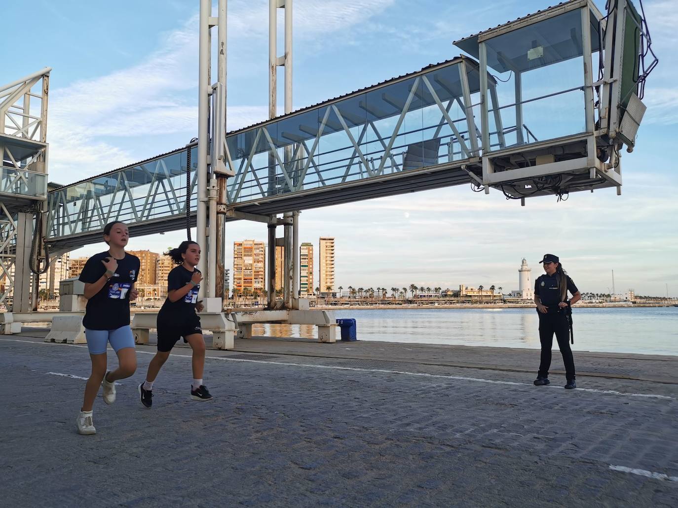 Fotos: Cuarta edición de la carrera solidaria &#039;Ruta 091&#039; impulsada por la Policía Nacional en Málaga