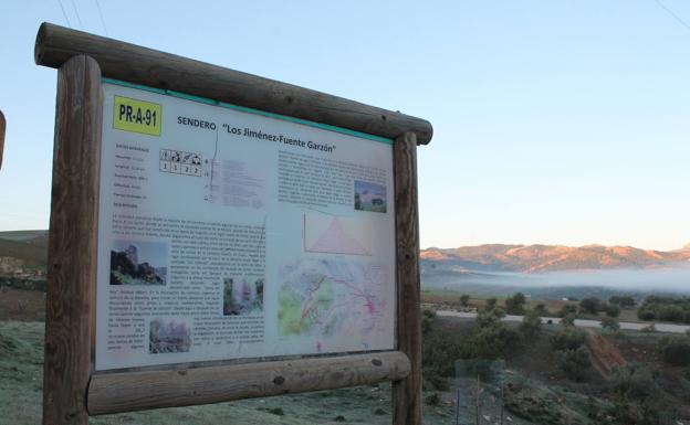 Llegada al inicio, junto al panel descriptivo de la ruta.