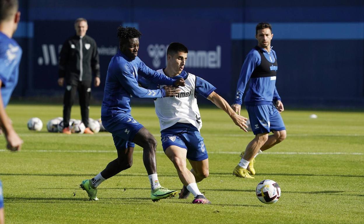 Lumor y Bustinza, durante el entrenamiento de ayer. 