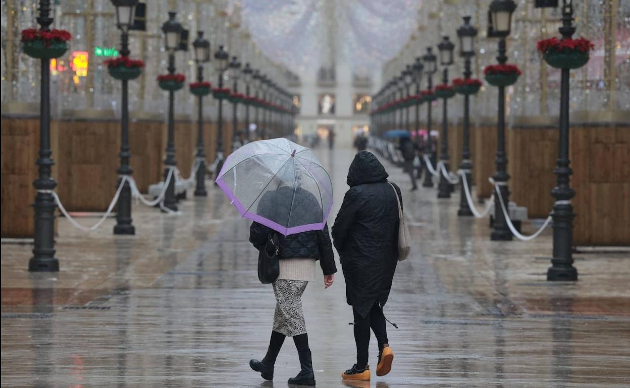 Lluvia sobre la calle Larios en días pasados.