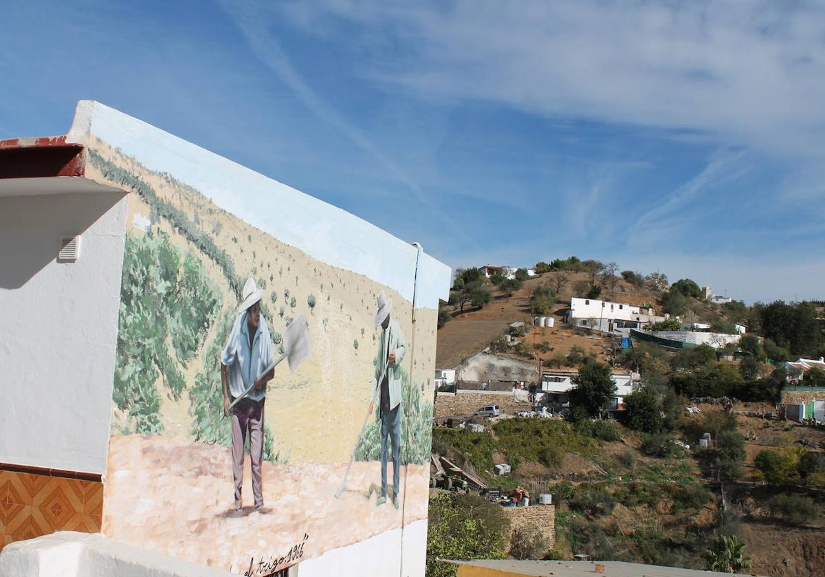 Imagen principal - Arriba, mural situado en la entrada de la aldea. Abajo, mapa donde se aprecia la singularidad de esta aldea con respecto a Gibralgalia e iglesia de Nuestra Señora de la Asunción, en el centro del núcleo.