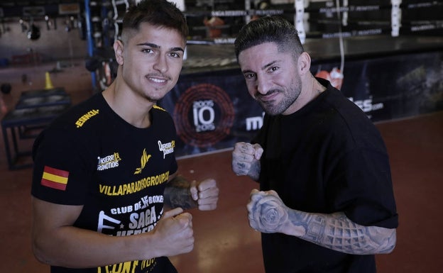 Samuel Molina con su entrenador, Boris Heredia. 