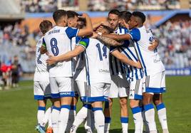 Jugadores del Recreativo de Huelva celebran un gol en su estadio, Nuevo Colombino, esta temporada.