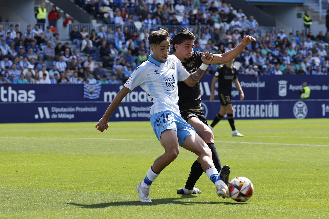 Las mejores imágenes del Málaga-Intercity de Primera RFEF