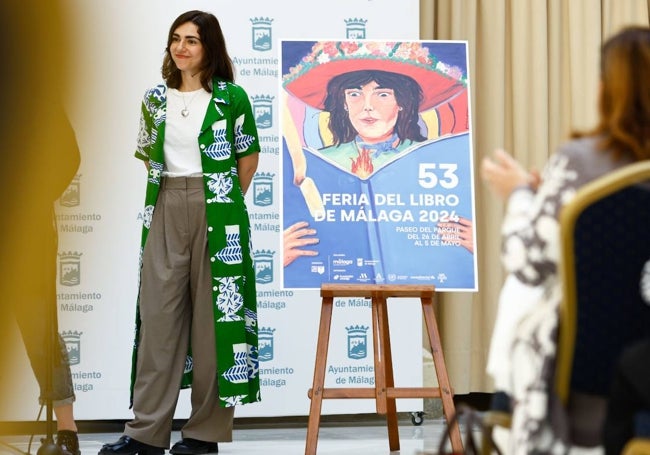 Patricia Paz, junto al cartel que ha diseñado para esta 53 edición de la Feria del Libro.