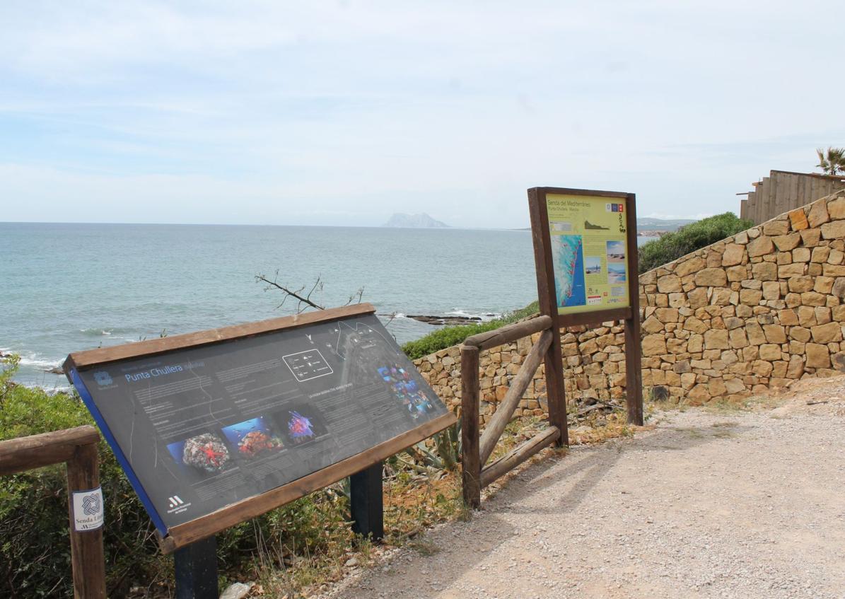 Imagen secundaria 1 - Su arenal está acotado por rocas y la playa está protegida por su valioso ecosistema. 