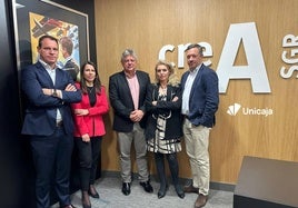 Firmantes del acuerdo entre la sociedad de garantía recíproca CREA y Unicaja.