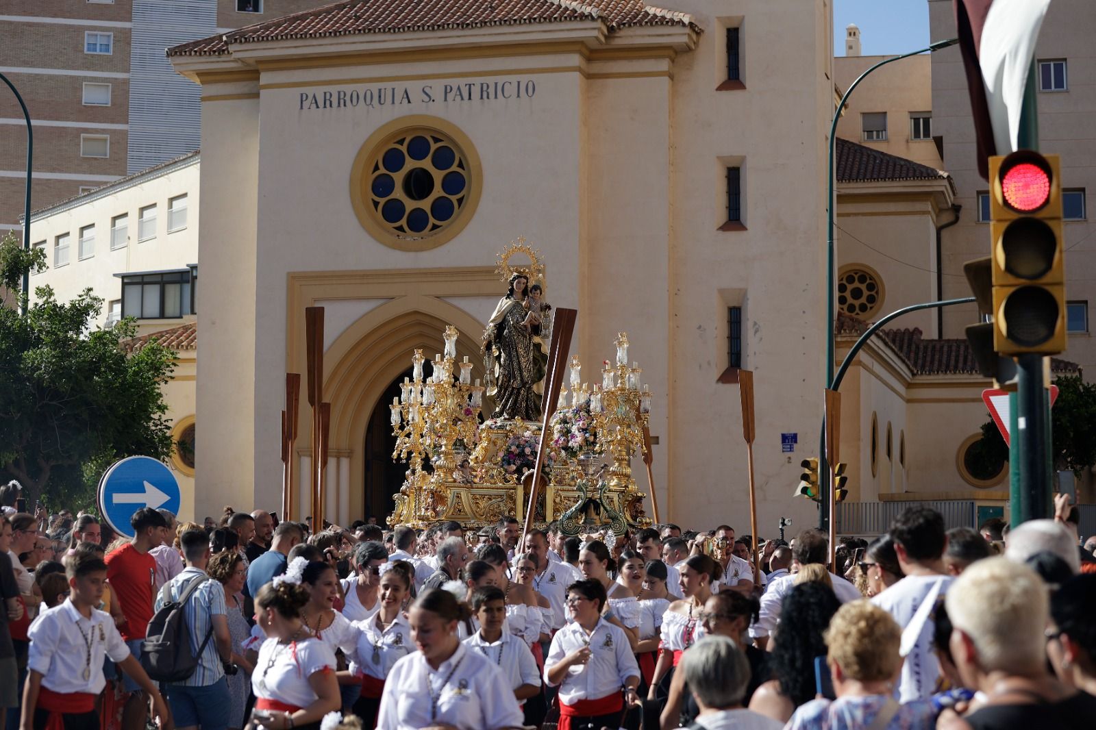 La procesión de la Virgen del Carmen de Huelin, en imágenes