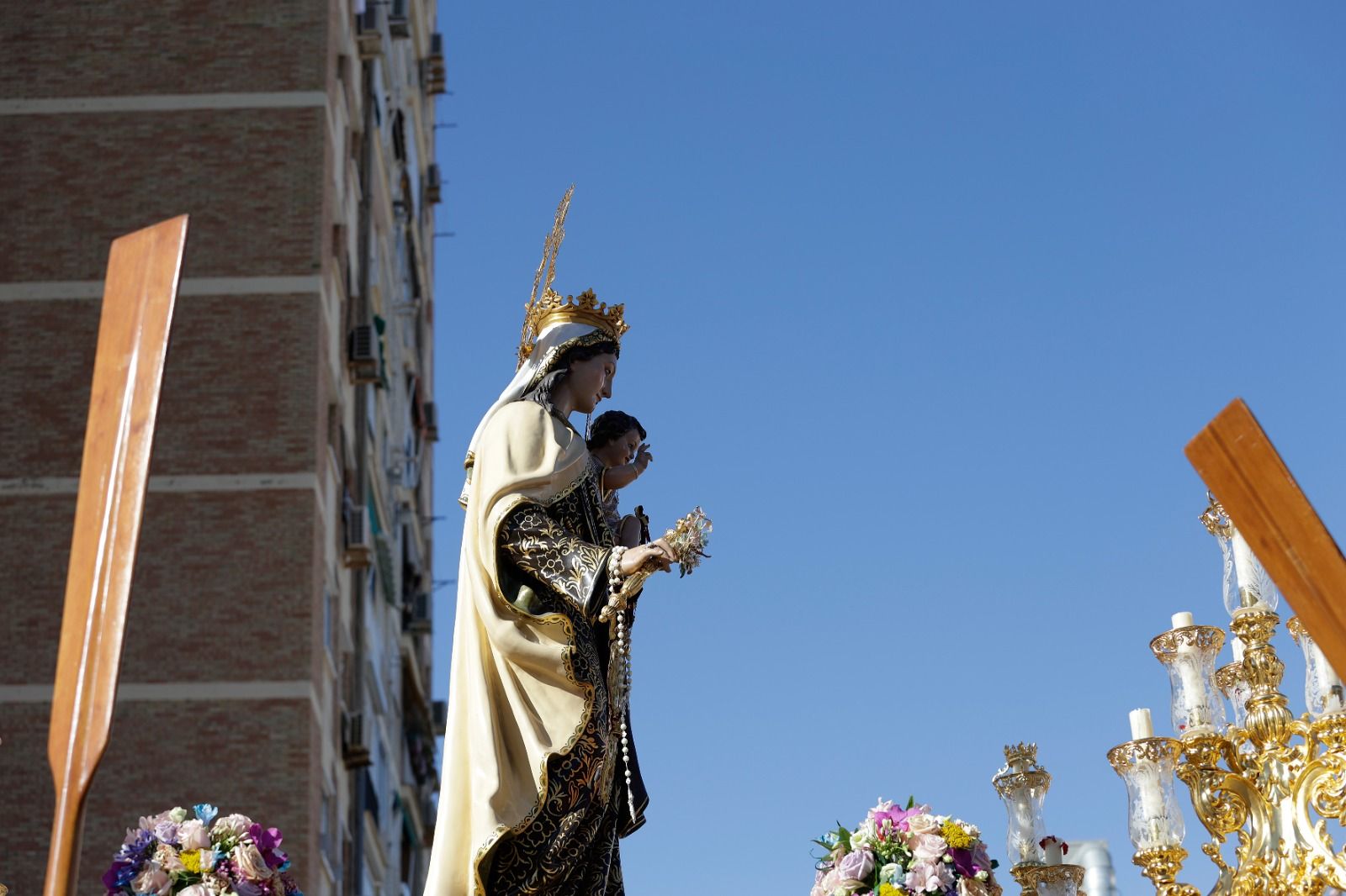 La procesión de la Virgen del Carmen de Huelin, en imágenes