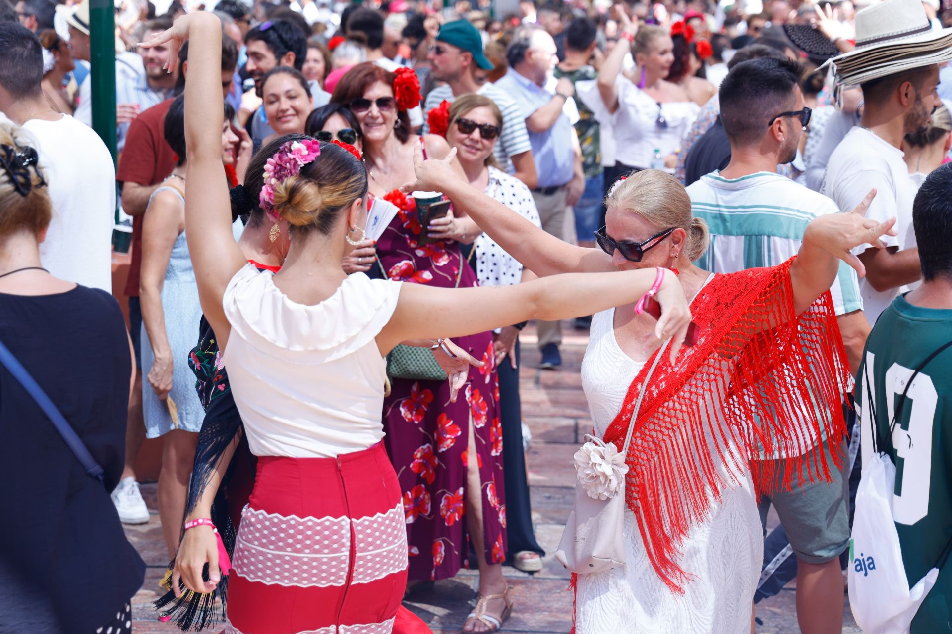 Ambiente en la Feria del centro de Málaga este martes 20 de agosto