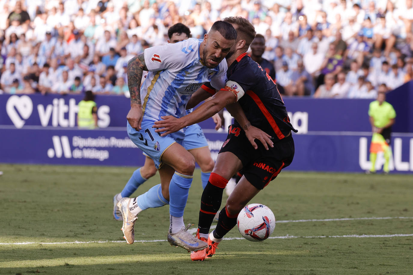 El Málaga-Huesca, en imágenes