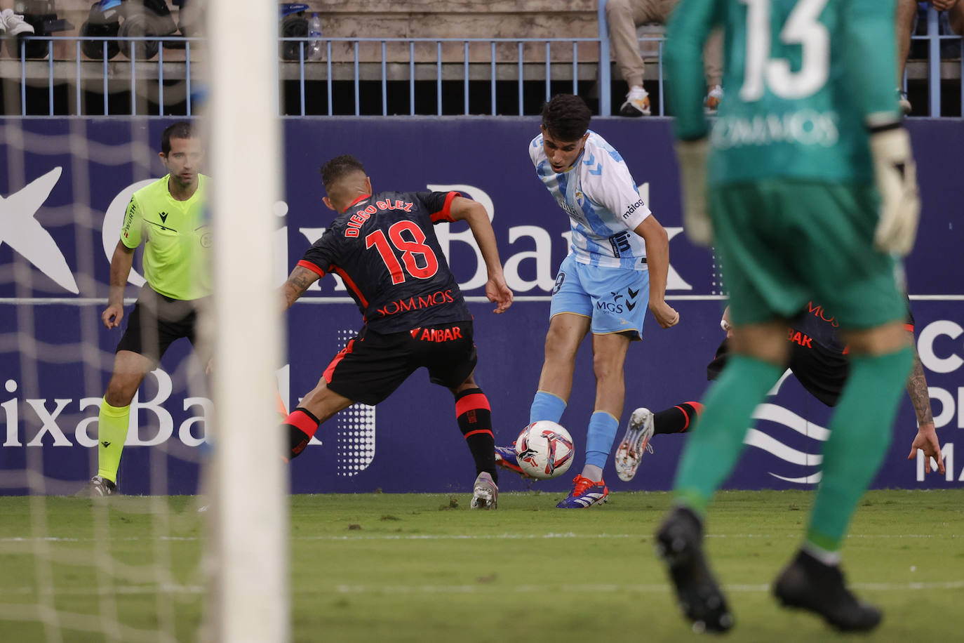 El Málaga-Huesca, en imágenes