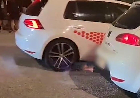 Vuelven las carreras ilegales: 100 personas y 40 coches en un polígono de Málaga