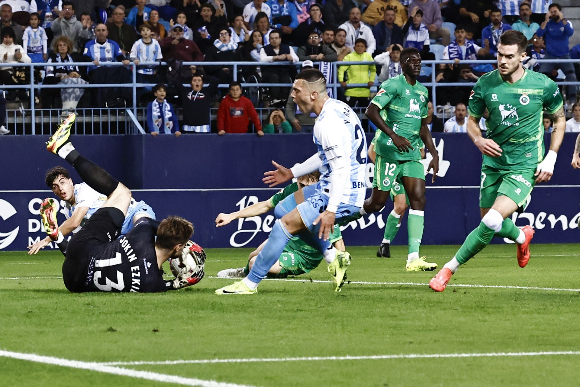 El Málaga - Racing, en imágenes