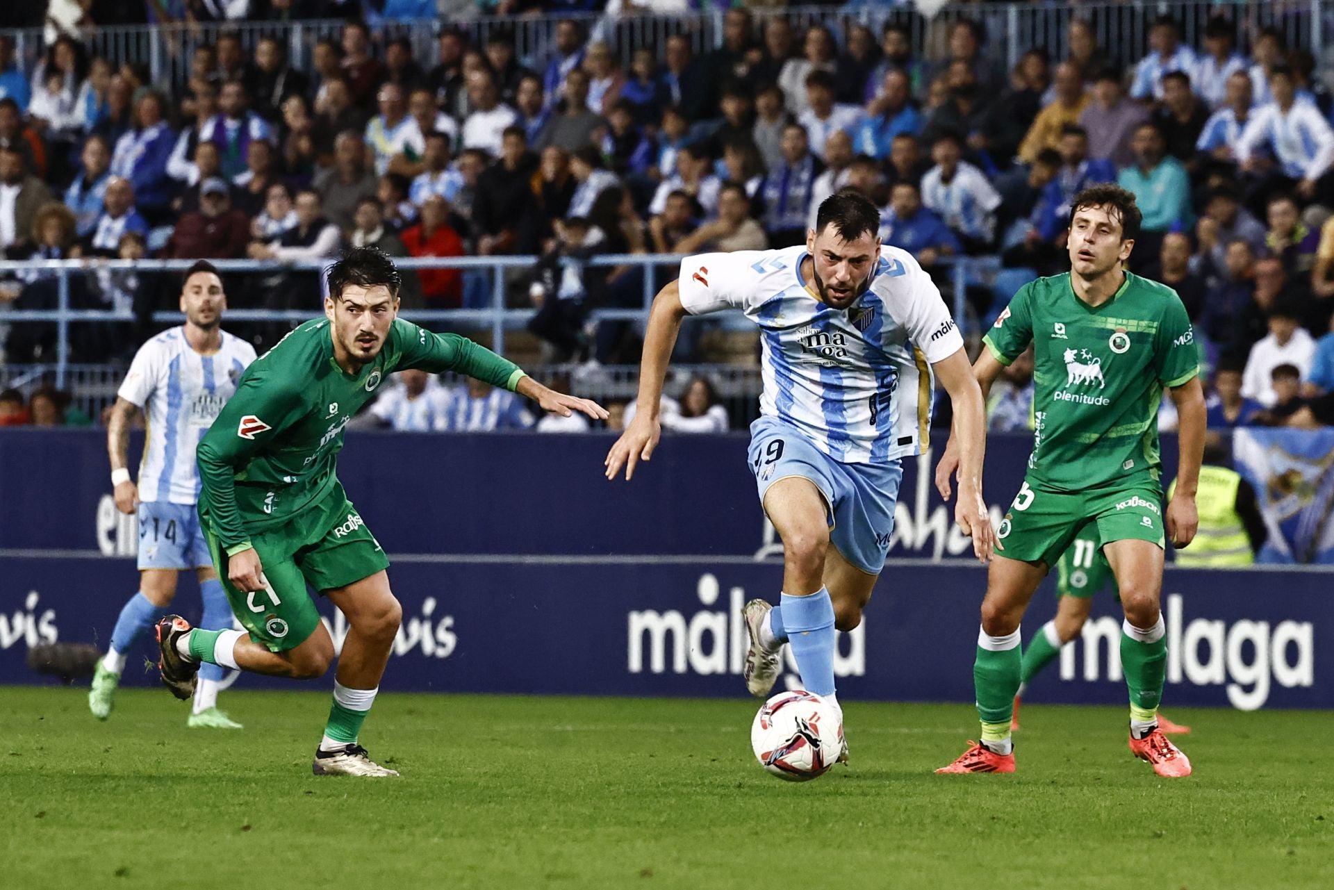 El Málaga - Racing, en imágenes