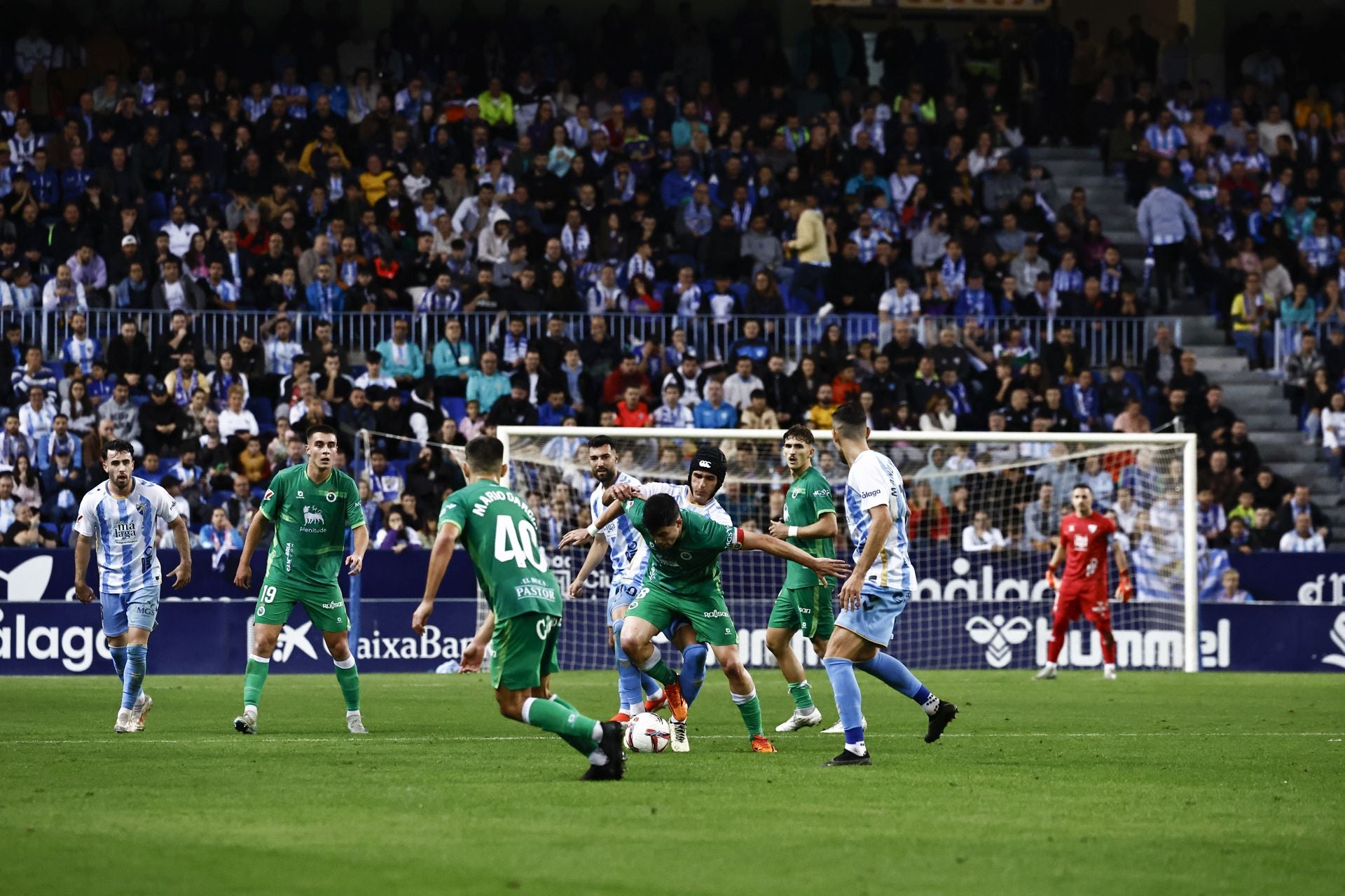 El Málaga - Racing, en imágenes