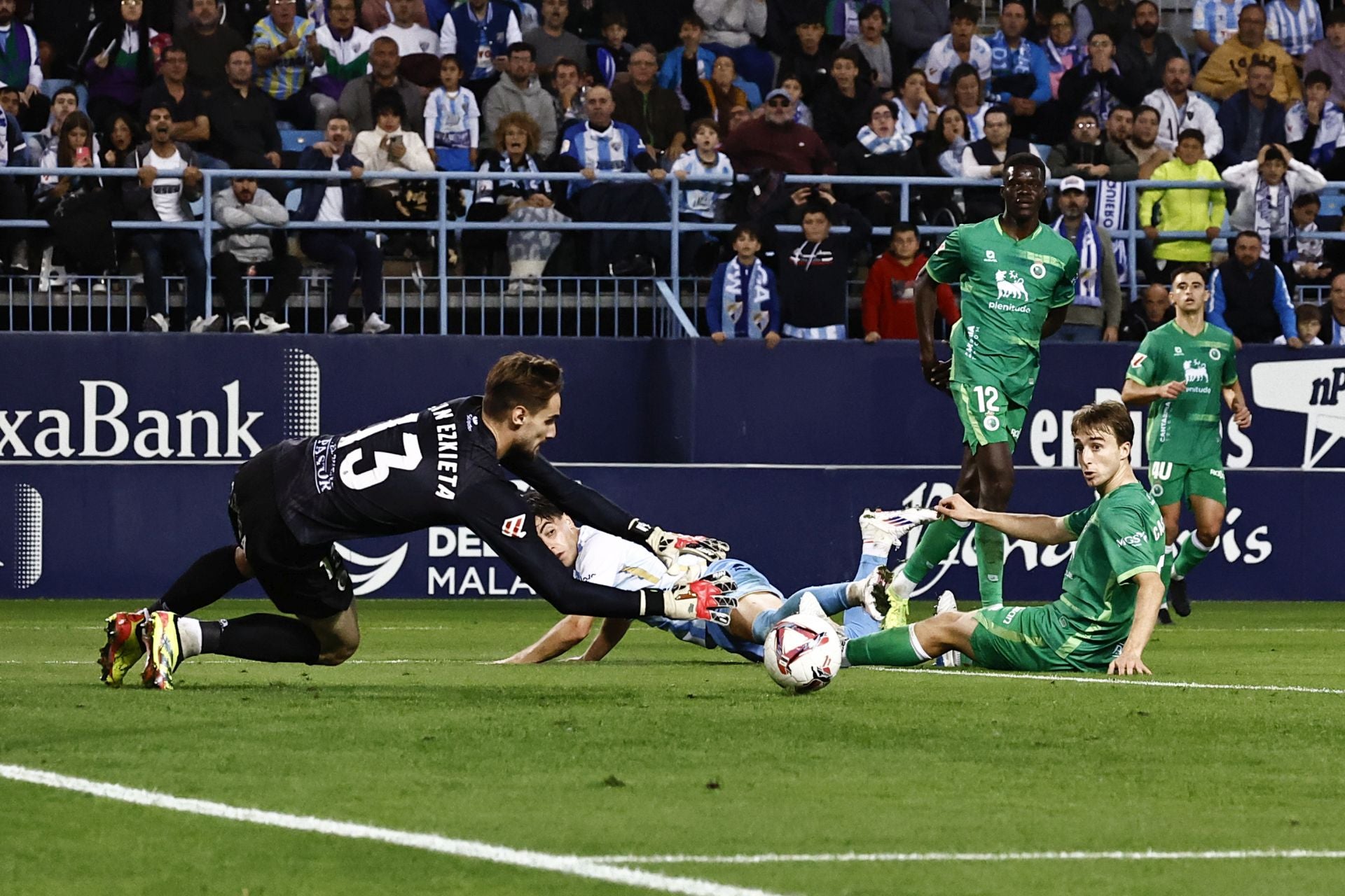 El Málaga - Racing, en imágenes