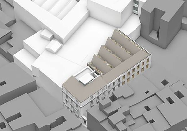 En blanco, el actual edificio MVA y a la derecha, la ampliación con fachada a Ollerías y pasaje de Meléndez.