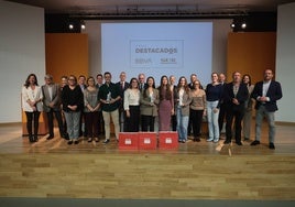 Organización, premiados y familiares, esta mañana durante el acto de entrega de reconocimientos.