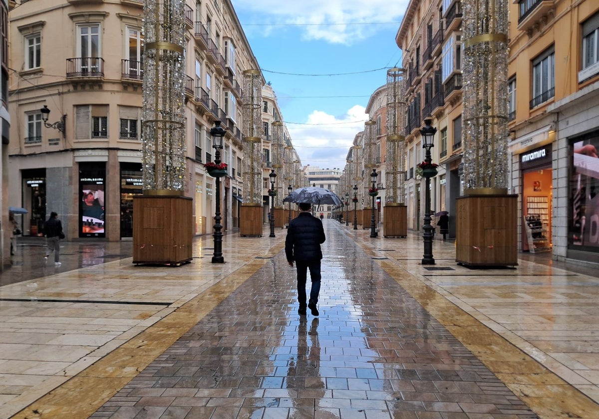 Los paraguas se dejaron ver en algunos momentos de enero en la calle Larios.