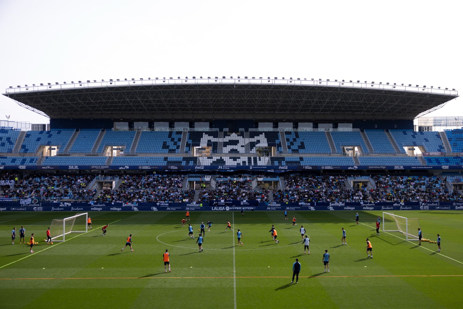 El entrenamiento del Málaga de puertas abiertas, en imágenes