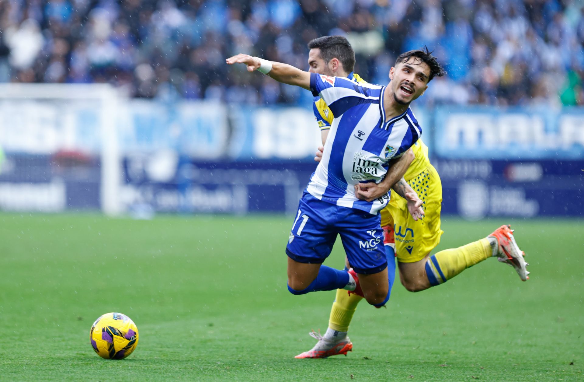 El Málaga - Cádiz, en imágenes