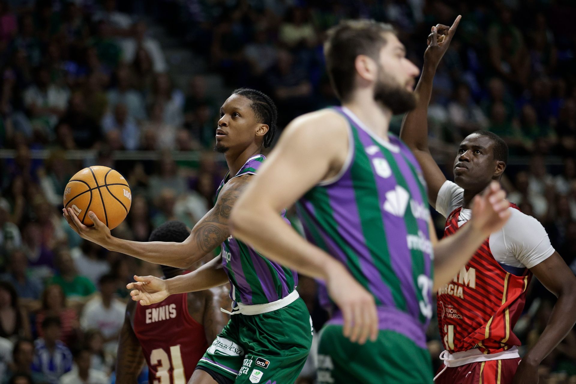 El Unicaja-UCAM, en imágenes
