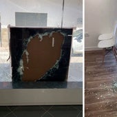 Imagen de los daños en la cristalera de la farmacia asaltada de madrugada.