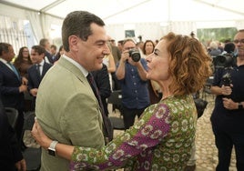 Juanma Moreno y María Jesús Montero, en el acto en Sevilla.
