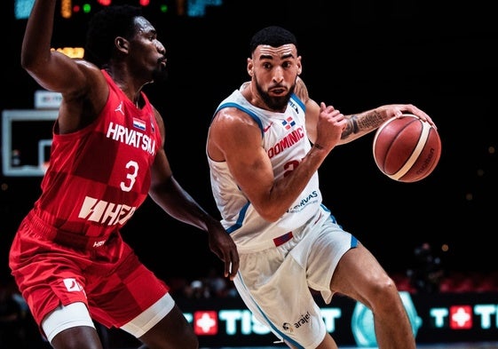 Chris Duarte, a la derecha, en un partido con su selección el pasado verano (1,96 metros, 28 años).