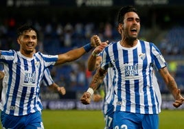 Escassi celebra un gol con el Málaga.