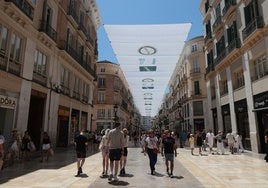 Son 52 lonas las que cubren calle Larios.